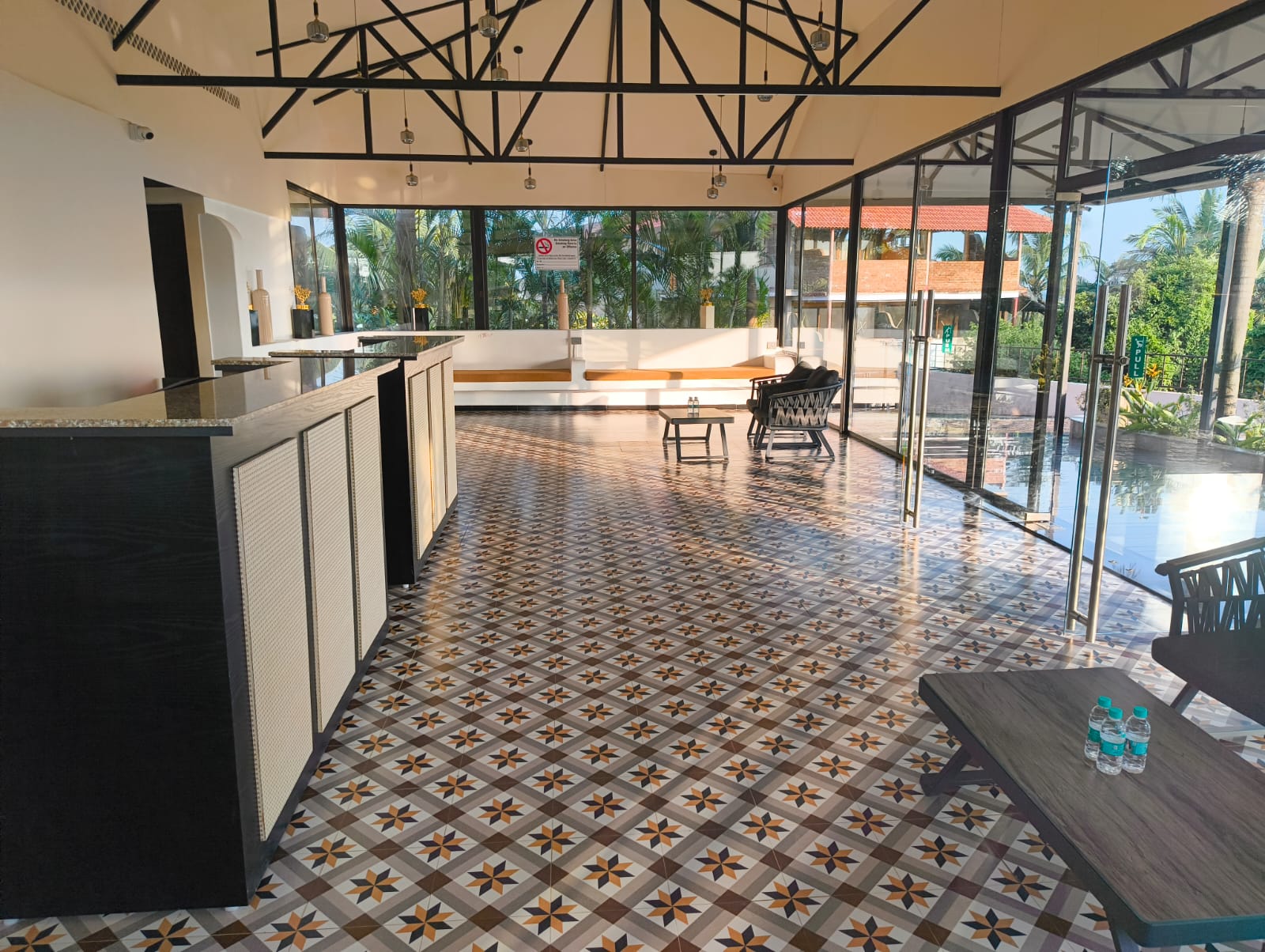 Reception desk and star-patterned floor in the lobby